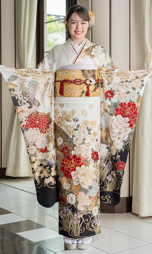 赤白の染分けた牡丹と薔薇