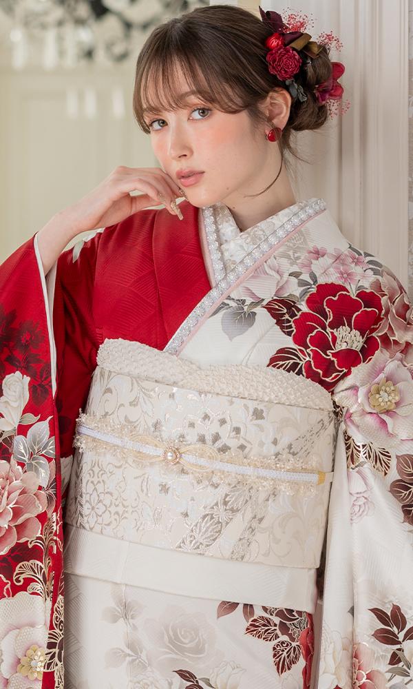 赤白の染分けた牡丹と薔薇